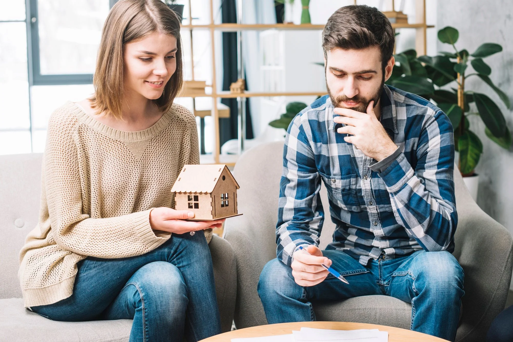 young-couple-thinking-mortgage (1).jpg